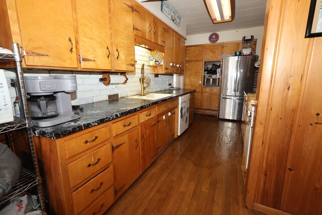 1022 Lorene Ave, Mount Morris, MI 48458 - kitchen featuring tasteful backsplash, dishwasher, stainless steel refrigerator, sink, and dark hardwood / wood-style floors