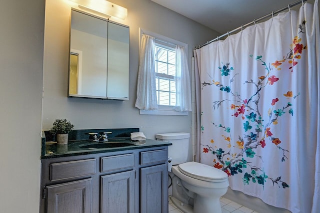 bathroom featuring vanity, tile patterned floors, toilet, and a shower with curtain