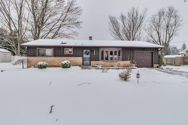 ranch-style home with a garage