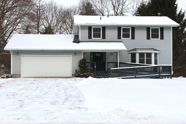 view of front of property with a garage