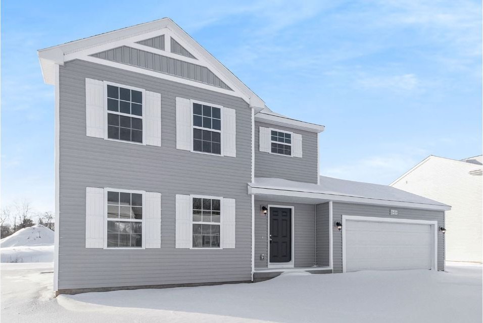 2855 Treymore St, Lapeer, MI 48446 - view of front of home featuring board and batten siding and an attached garage