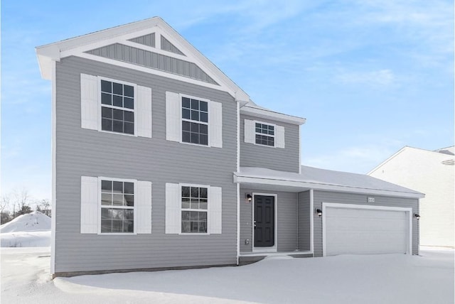 view of front of home featuring board and batten siding and an attached garage