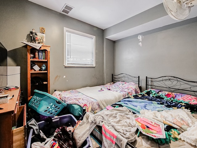 bedroom with visible vents