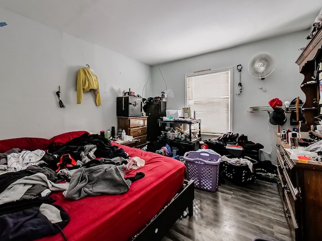 bedroom featuring wood finished floors