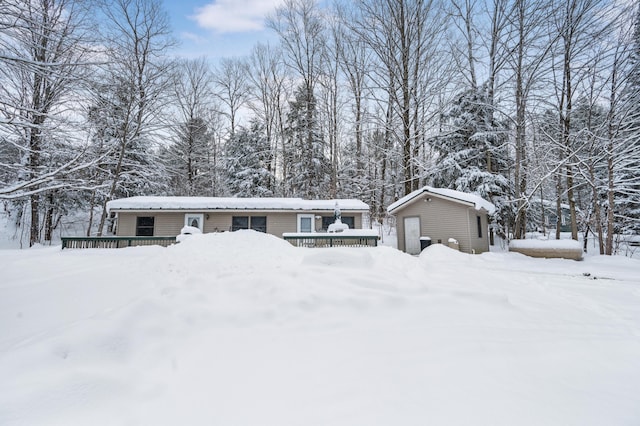 view of front of house featuring an outbuilding and a garage