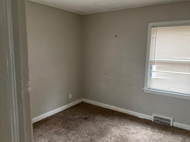 empty room with carpet flooring