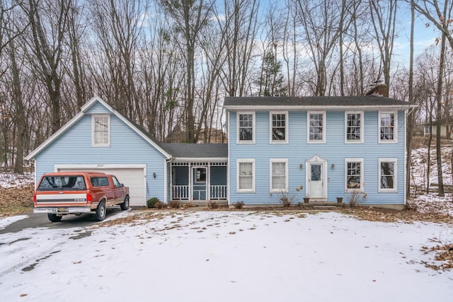 view of front of property with a garage