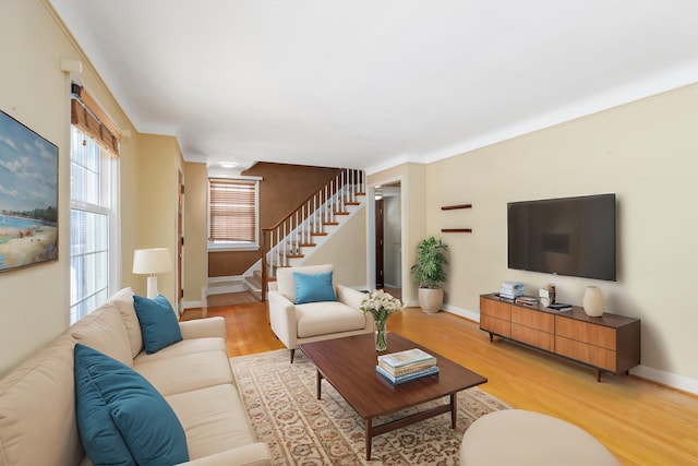 living room with light hardwood / wood-style flooring