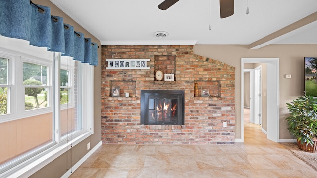 unfurnished living room with a fireplace, visible vents, a ceiling fan, vaulted ceiling, and baseboards