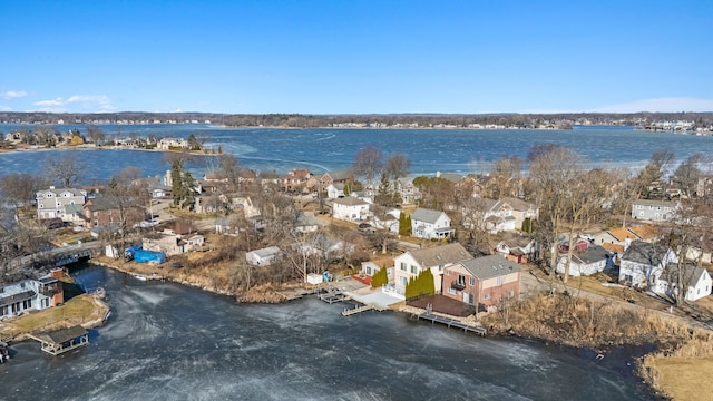 aerial view with a residential view and a water view