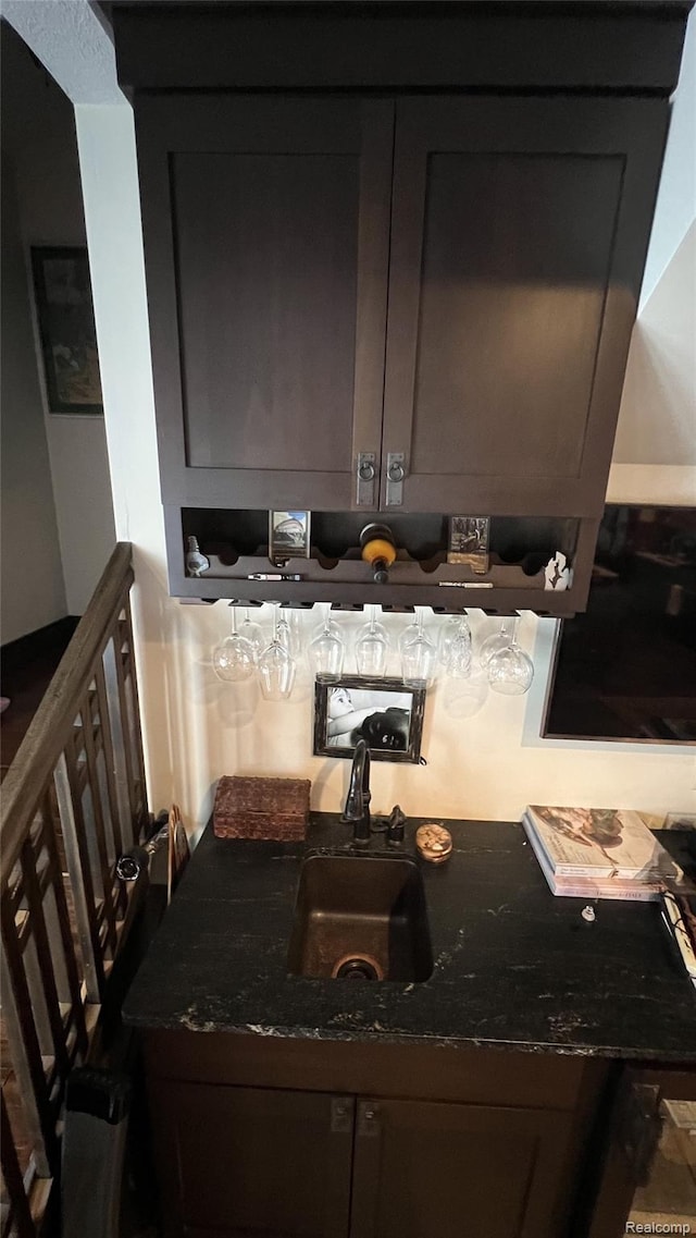 11720 Easy St, Kewadin, MI 49648 - detailed view of bar and dark stone counters