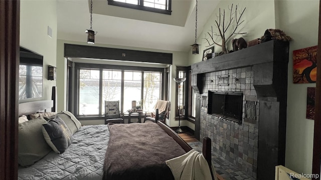 11720 Easy St, Kewadin, MI 49648 - bedroom with multiple windows and a high ceiling