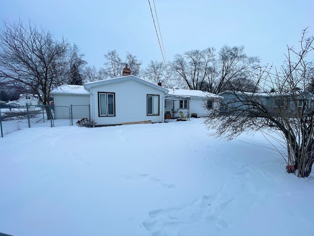 view of snow covered front of house