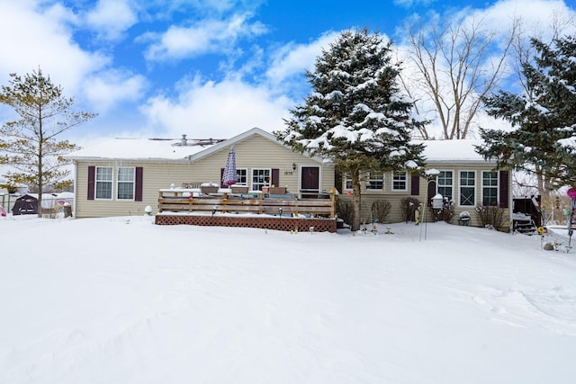 view of front of home with a deck