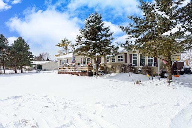 view of front of home with a deck