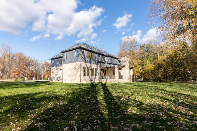 view of property exterior featuring a yard