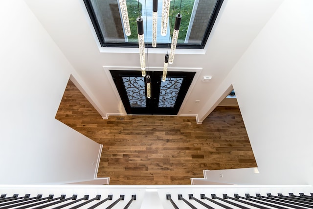 foyer featuring wood-type flooring