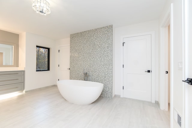 bathroom featuring vanity and a bathtub