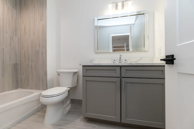 full bathroom featuring vanity, shower / bathtub combination, and toilet