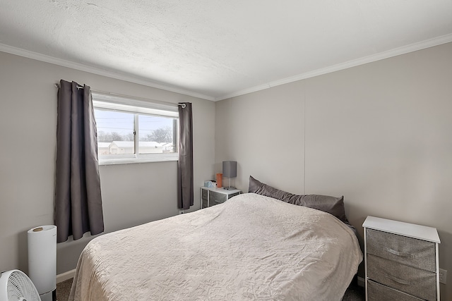 bedroom with carpet floors, crown molding, and a textured ceiling