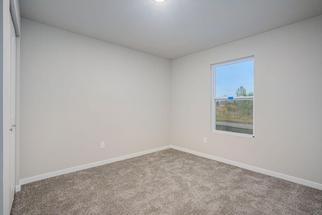 view of carpeted spare room