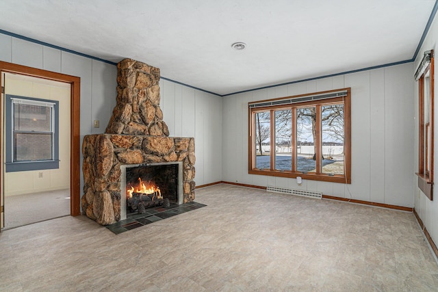 unfurnished living room featuring a stone fireplace