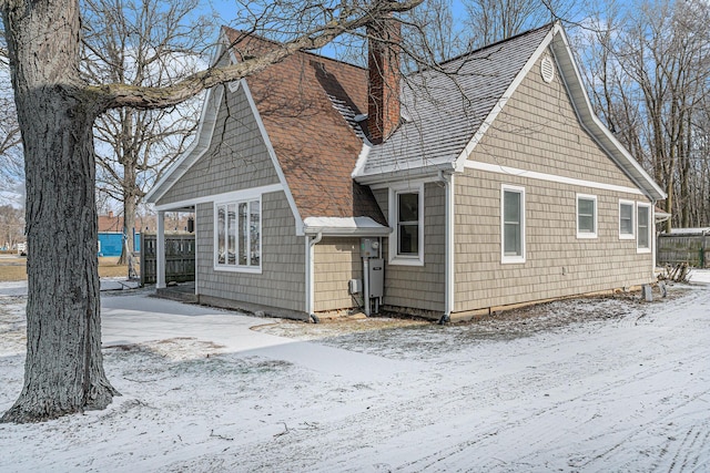 view of snow covered property