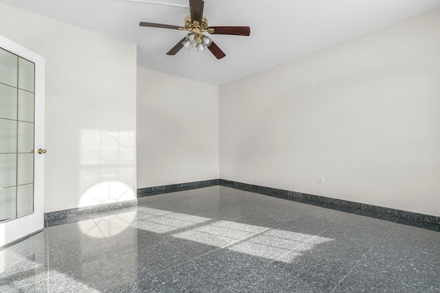 unfurnished room with ceiling fan