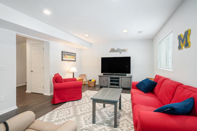 living room featuring dark hardwood / wood-style floors