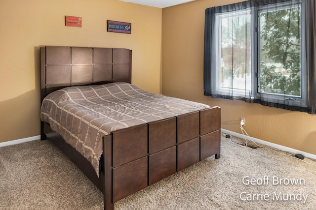 bedroom featuring light carpet