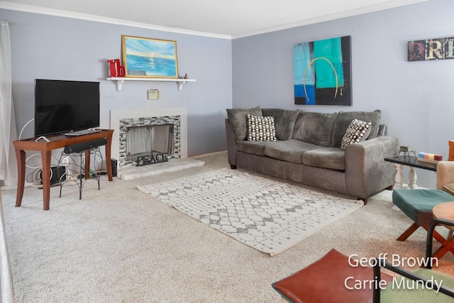 carpeted living room with ornamental molding