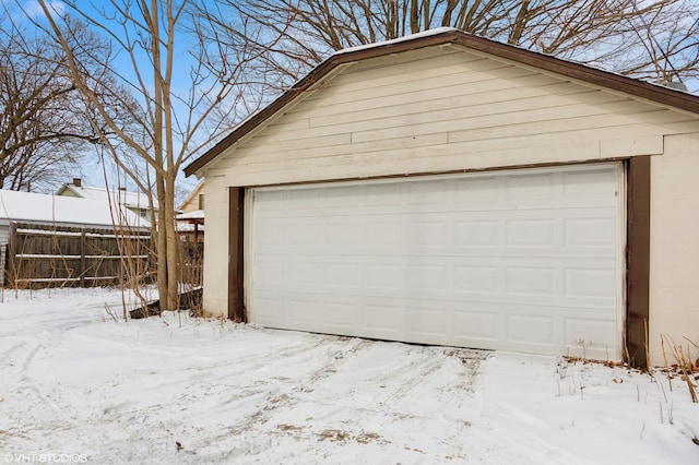 view of snow covered garage