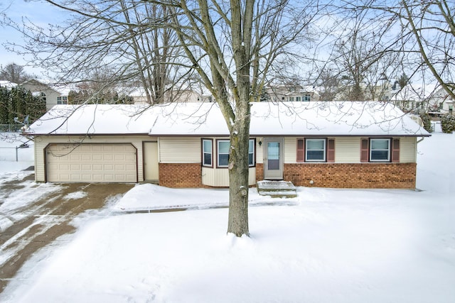 single story home featuring a garage