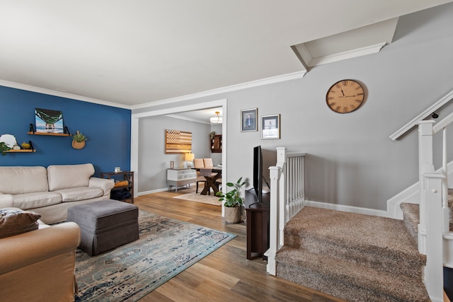 living room featuring crown molding and wood-type flooring