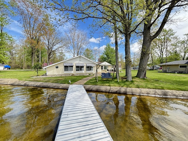 509 Warren Rd, Coldwater, MI 49036 - dock with a lawn and a water view