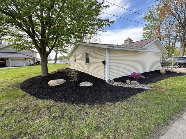 509 Warren Rd, Coldwater, MI 49036 - view of property exterior with a lawn