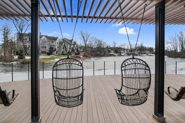 wooden terrace featuring a residential view