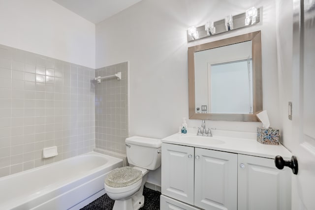 full bathroom featuring tiled shower / bath combo, vanity, and toilet