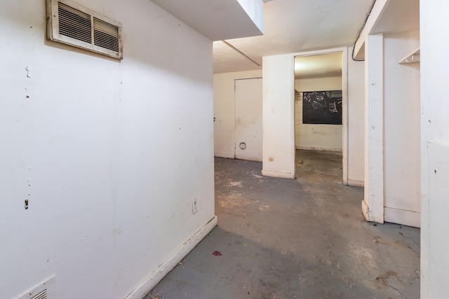 unfinished basement featuring visible vents