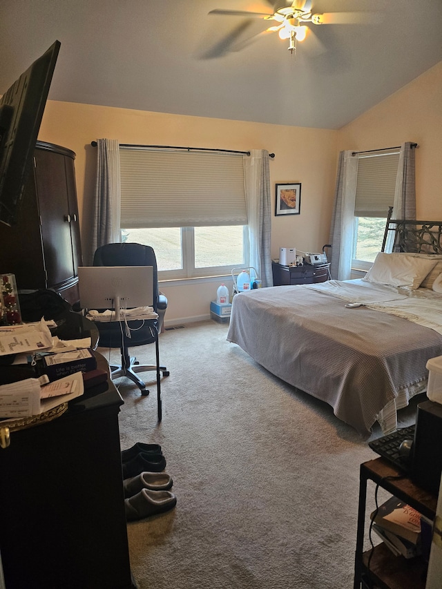 bedroom featuring ceiling fan, carpet floors, and lofted ceiling