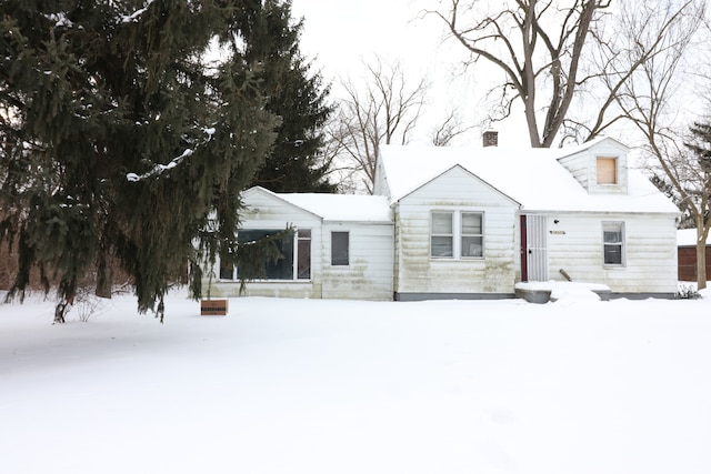 view of snow covered house