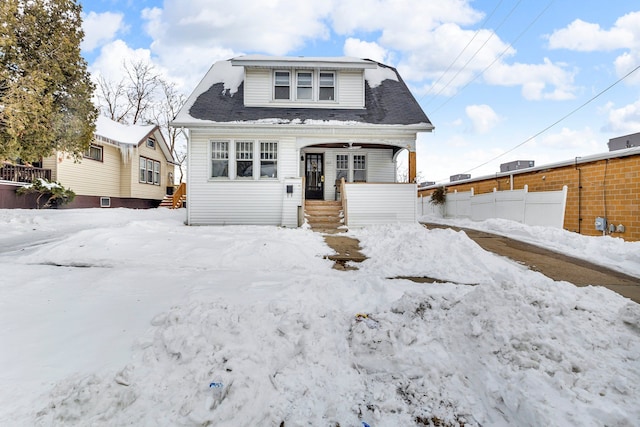 view of front of home with fence