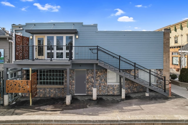 view of building exterior featuring stairs