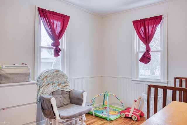 bedroom featuring multiple windows and crown molding