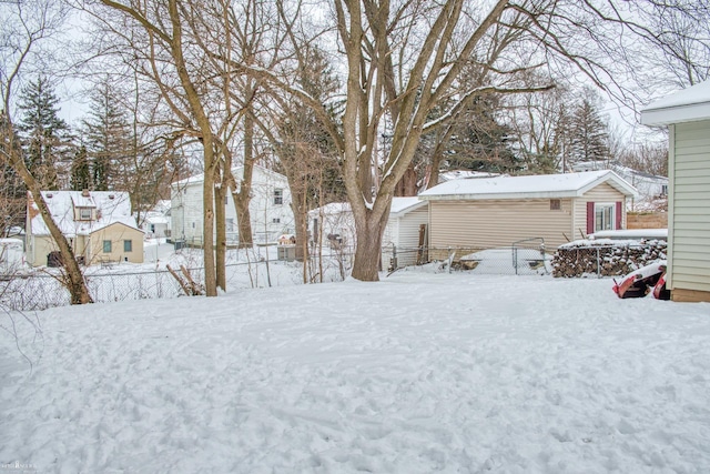 view of yard covered in snow