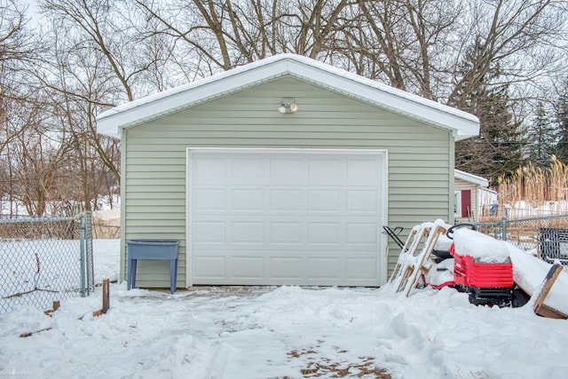 view of snow covered garage