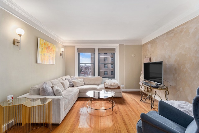 living room with crown molding, baseboards, and wood-type flooring