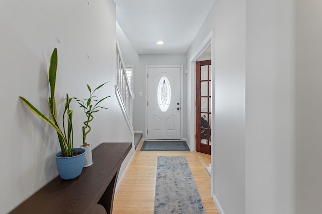 entryway with light hardwood / wood-style floors