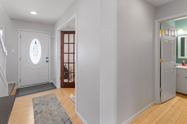 foyer with light wood-type flooring