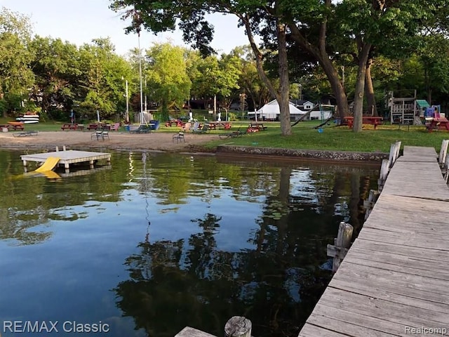 dock area featuring a water view